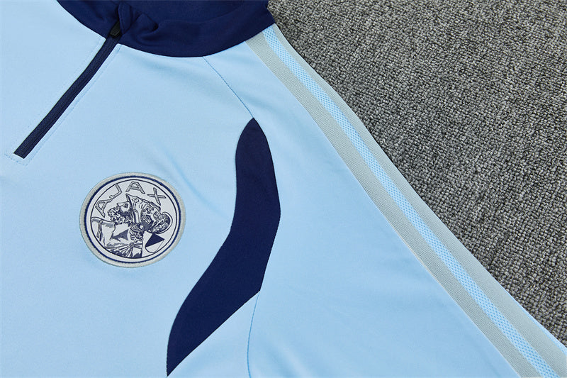 Ajax 26/27 Light Blue/Navy Training Tracksuit Set
