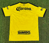 America 26/27 Yellow/Red/Black Home Jersey