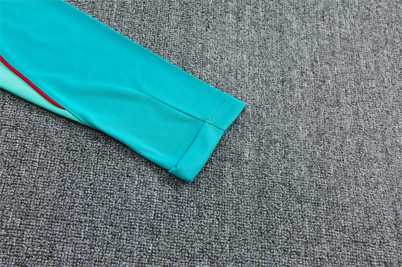 Barcelona 26/27 Deep Blue/Mint-Green Quarter-Zip Third Long Sleeve Tracksuit