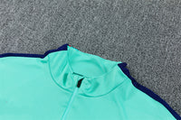 Barcelona 26/27 Deep Blue/Mint-Green Quarter-Zip Third Long Sleeve Tracksuit