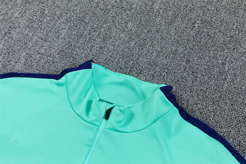 Barcelona 26/27 Deep Blue/Mint-Green Quarter-Zip Third Long Sleeve Tracksuit