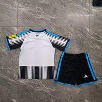 Newcastle 26/27 Black/White Barcode Stripe Home Kids Jersey Set