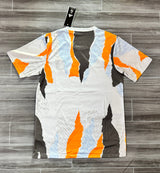 Real Madrid 25/26 Orange/Charcoal Pre Match Jersey - Concept Kits