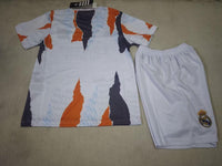 Real Madrid 25/26 Orange/Charcoal Training Kids Jersey Set