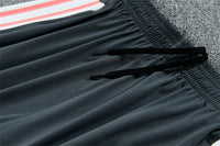 Real Madrid 26/27 Coral Pink/Dark Gray Tracksuit Set