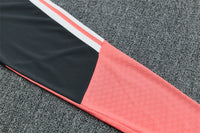 Real Madrid 26/27 Coral Pink/Dark Gray Tracksuit Set