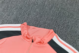 Real Madrid 26/27 Coral Pink/Dark Gray Tracksuit Set