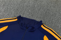 Real Madrid 26/27 Navy and White with Orange Stripes Training Tracksuit Set